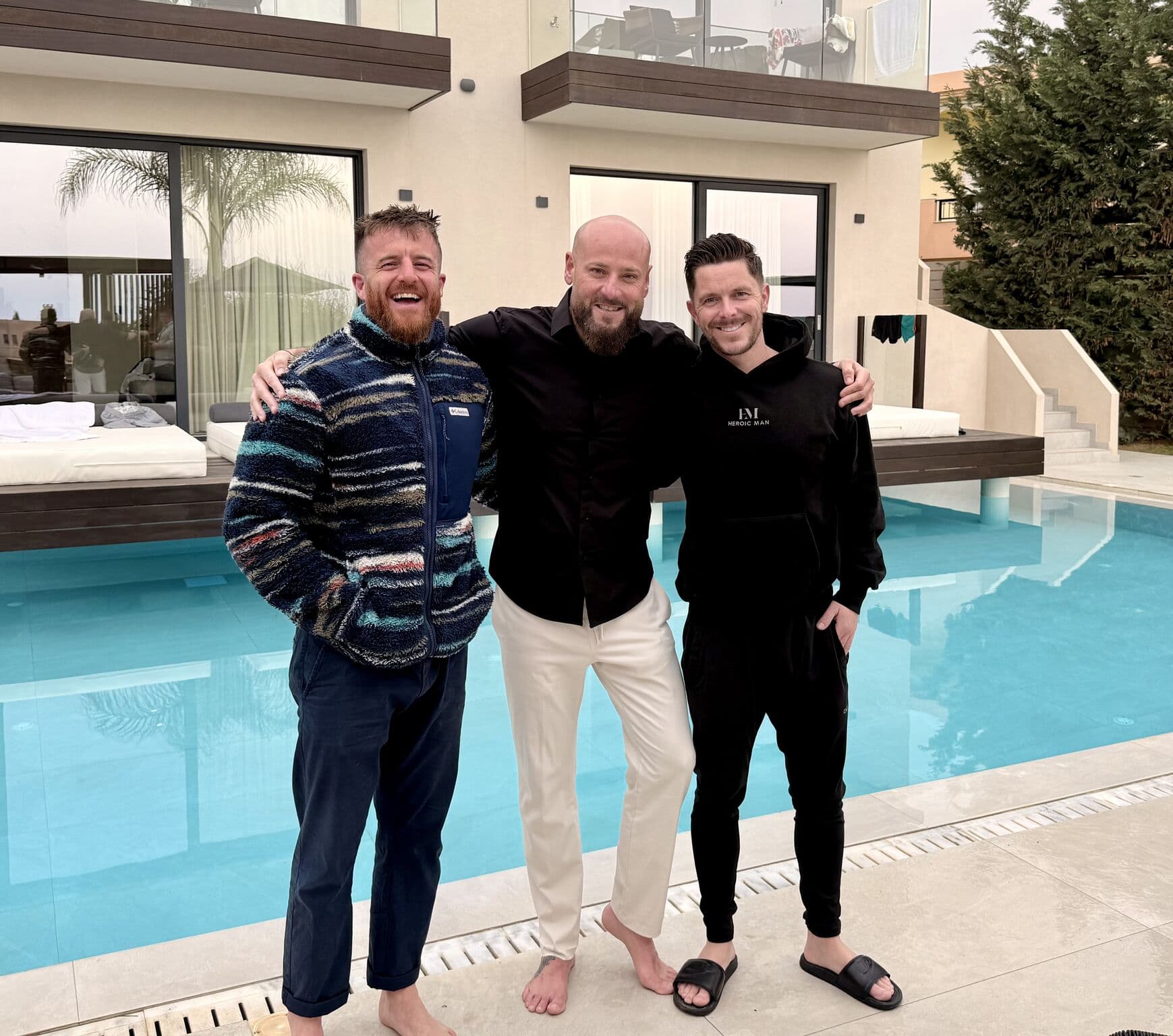 Three operators by the pool, casual moment